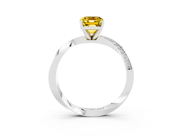 White gold Emerald Cut Yellow Sapphire Engagement Ring with Side Stone Accents and Four-Prong Setting