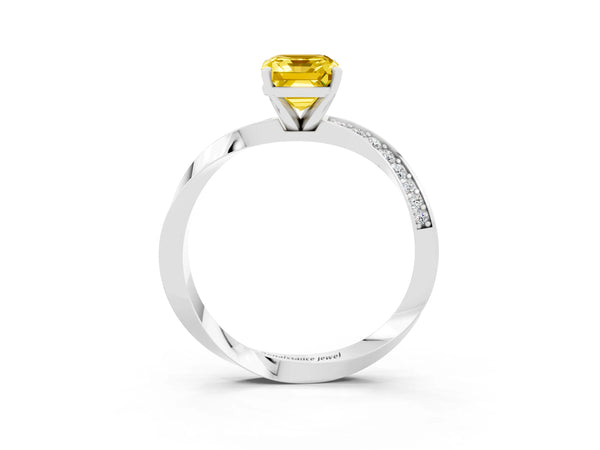 Platinum Emerald Cut Yellow Sapphire Engagement Ring with Side Stone Accents and Four-Prong Setting