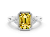 White gold Emerald Cut Yellow Sapphire Halo Ring with Tapered Band and Four-Prong Setting