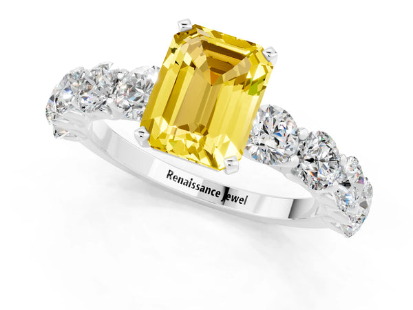 White gold Emerald Cut Yellow Sapphire Prong Setting with Side Stones on a Pave Band