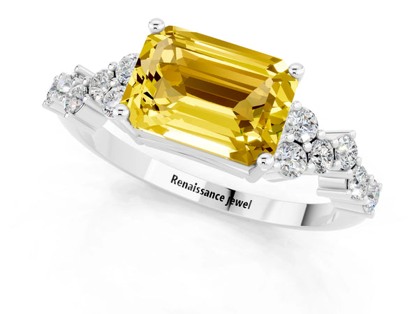 Platinum Emerald Cut Yellow Sapphire Scattered Round Accent Ring with Prong Setting