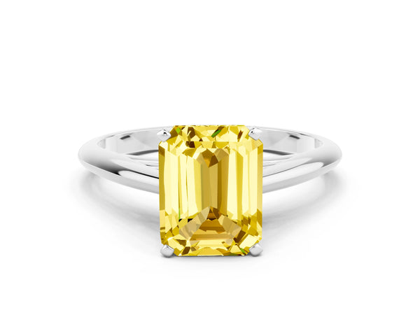 White gold Emerald Cut Yellow Sapphire Solitaire Engagement Ring with Cathedral Setting and Four-Prong Mount