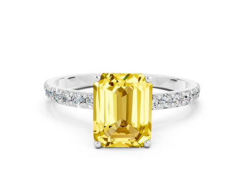 White gold Emerald Cut Yellow Sapphire Solitaire Engagement Ring with Pavé Band and Prong Setting
