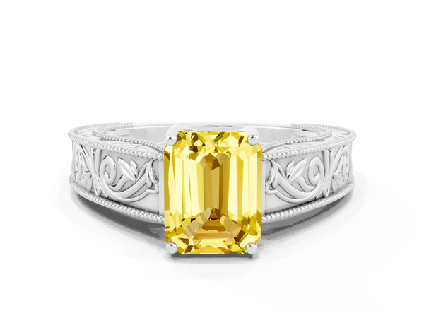 Platinum Emerald Cut Yellow Sapphire Solitaire Ring with Engraved Band and Four-Prong Setting