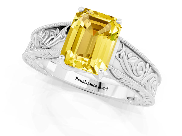 White gold Emerald Cut Yellow Sapphire Solitaire Ring with Engraved Band and Four-Prong Setting