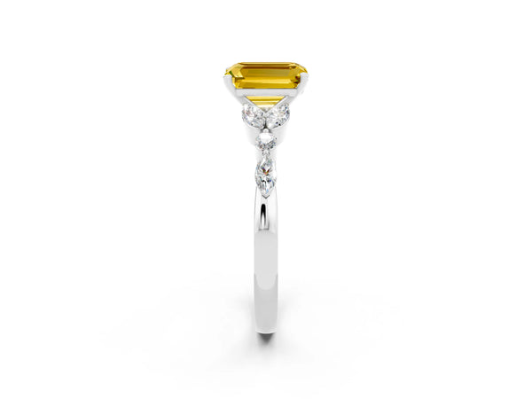 Platinum Emerald Cut Yellow Sapphire Solitaire Ring with Side Stones and Four-Prong Setting