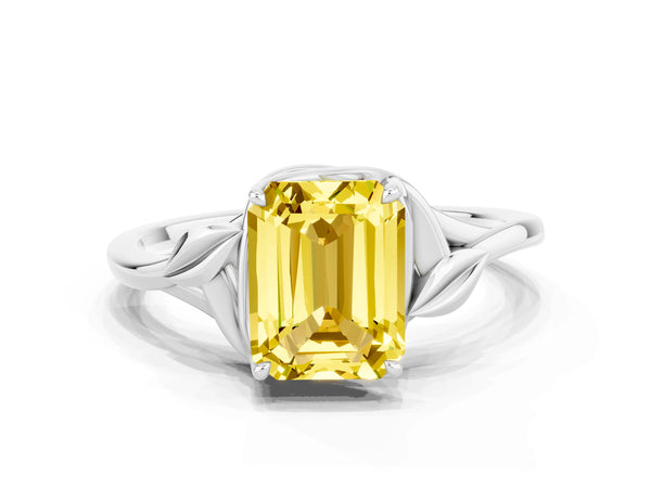 Platinum Emerald Cut Yellow Sapphire Solitaire Ring with Twist Band and Four-Prong Setting
