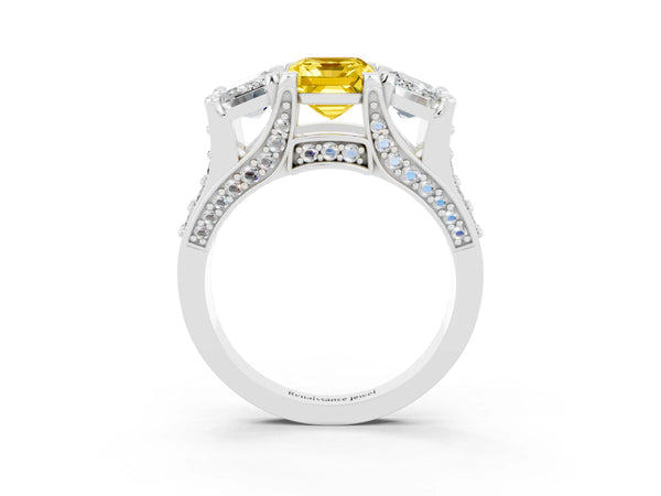 Platinum Emerald Cut Yellow Sapphire Three-Stone Ring with Channel Set Band and Four-Prong Setting