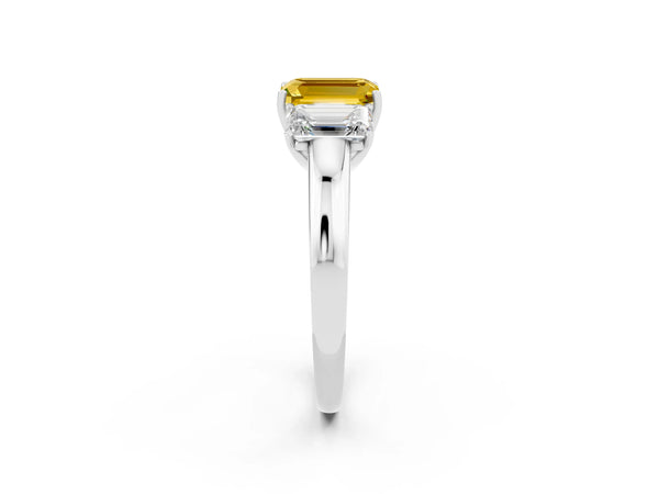 Platinum Emerald Cut Yellow Sapphire Three-Stone Ring with Four-Prong Setting and Classic Band