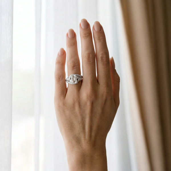 White gold Emerald Diamond Halo Ring with Marquise and Pavé Band in Prong Setting