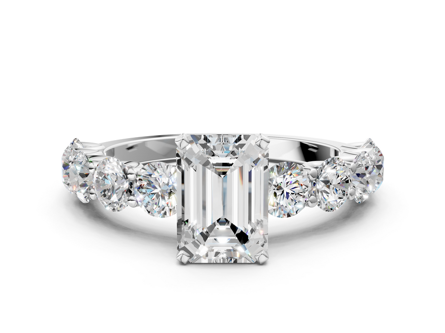 White gold Emerald Cut Diamond Prong Setting with Side Stones on a Pave Band