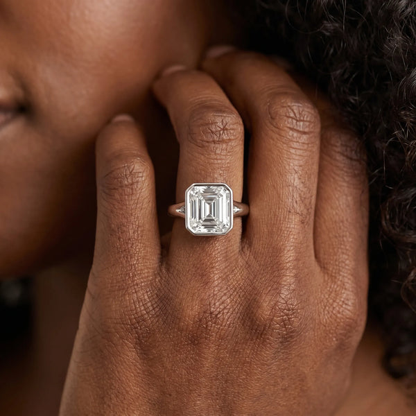 White gold Emerald Diamond Solitaire Ring with Bezel Setting and Classic Band