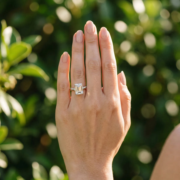 White gold Emerald Solitaire Beaded Band with Four-Prong Setting