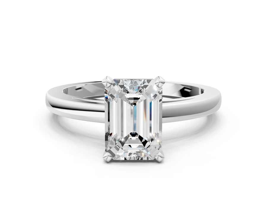 White gold Emerald Solitaire Diamond Engagement Ring with Four-Prong Setting on a Classic Band