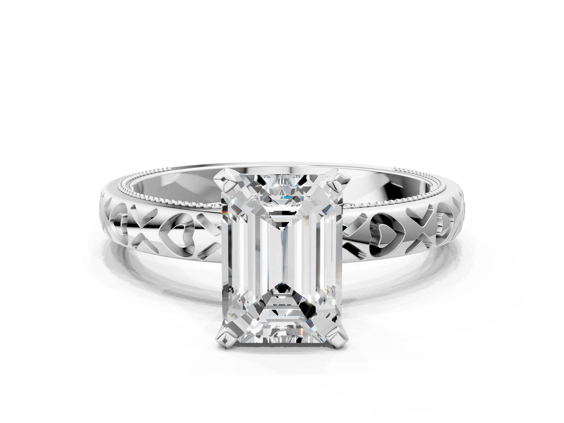 White gold Emerald Solitaire Diamond Engagement Ring with XO Engraved Band and Four-Prong Setting