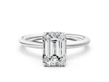 White gold Emerald Solitaire Diamond Ring with a Classic Band and Four-Prong Setting