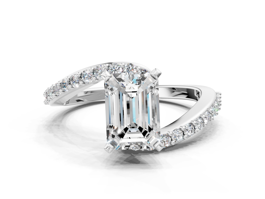 White gold Emerald Solitaire Twist Band with Pave Set Diamonds and Four-Prong Setting_140