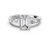 White gold Emerald Solitaire with Tapered Baguette Side Stones on a Classic Band with Four-Prong Setting_221