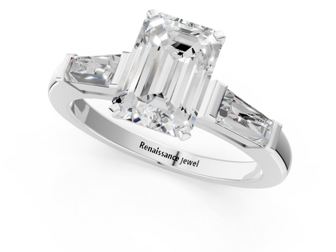 White gold Emerald Solitaire with Tapered Baguette Side Stones on a Classic Band with Four-Prong Setting_222