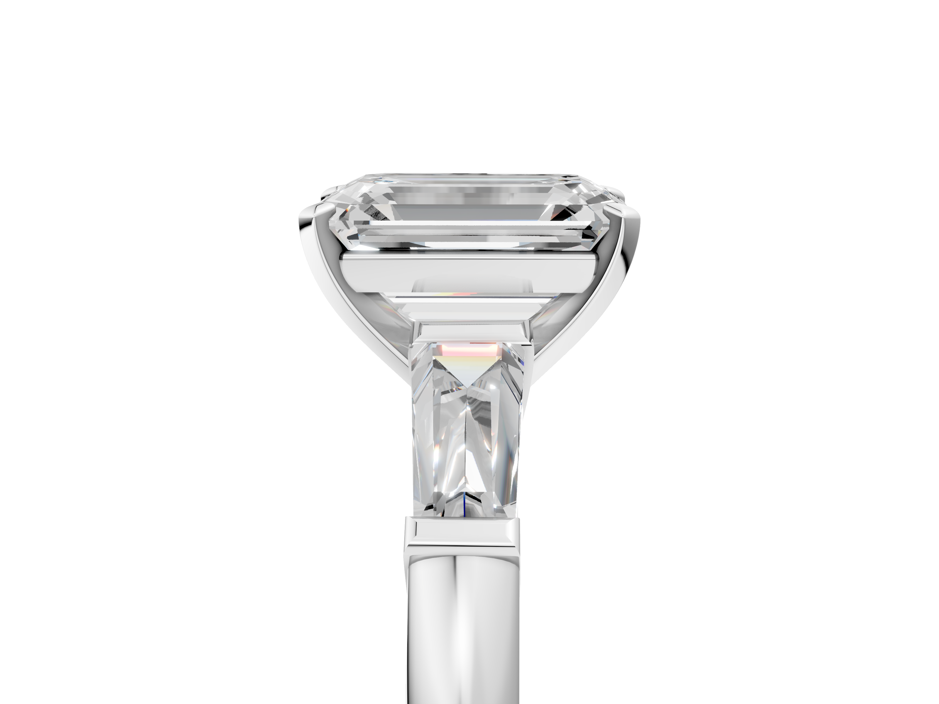White gold Emerald Solitaire with Tapered Baguette Side Stones on a Classic Band with Four-Prong Setting_226
