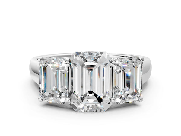 White gold Emerald Three-Stone Diamond Ring with Prong Setting on a Classic Band
