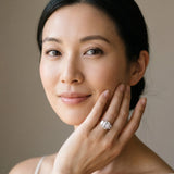 White gold Emerald Three-Stone Diamond Ring with Prong Setting on a Classic Band_4