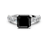 White gold Fancy Black Asscher Cut Diamond Prong Setting with Side Stones on a Pave Band