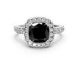White gold Fancy Black Cushion Cut Diamond Halo Ring with Pavé Band and Prong Setting
