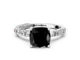 White gold Fancy Black Cushion Cut Diamond Solitaire with Side Baguettes and Channel Set Band