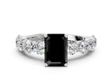White gold Fancy Black Emerald Cut Diamond Prong Setting with Side Stones on a Pave Band