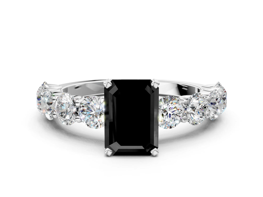 White gold Fancy Black Emerald Cut Diamond Prong Setting with Side Stones on a Pave Band