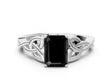 White gold Fancy Black Emerald Cut Diamond Solitaire Engagement Ring with Celtic Knot Band and Four-Prong Setting