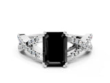 White gold Fancy Black Emerald Cut Diamond Solitaire Ring with Four-Prong Setting and Twisted Pavé Band