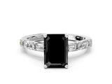 White gold Fancy Black Emerald Cut Diamond Solitaire with Side Baguettes and Channel Set Band