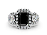 White gold Fancy Black Emerald Cut Diamond Three-Stone Halo Ring with Prong Setting and Pavé Accents