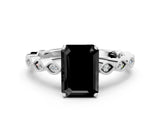 White gold Fancy Black Emerald Cut Solitaire Diamond Ring with Infinity Twist Band and Four-Prong Setting