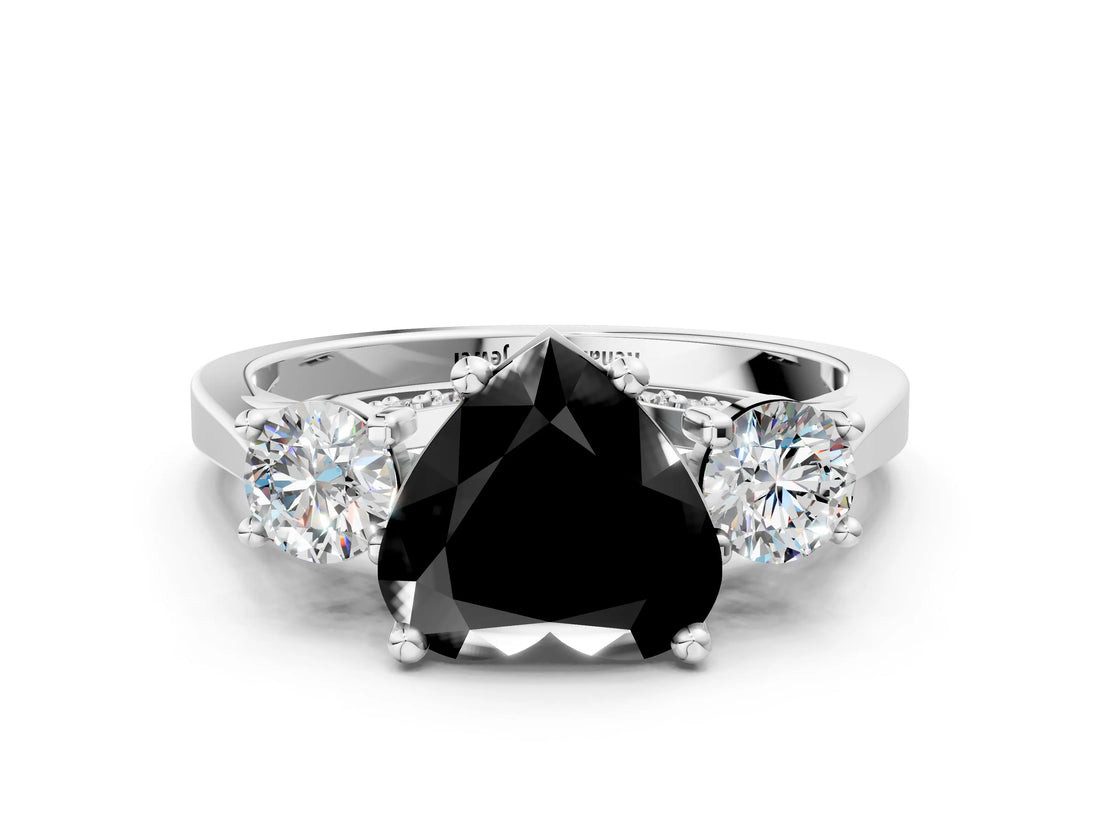 White gold Fancy Black Heart Cut Diamond Three-Stone Engagement Ring with Prong Setting and Pavé Band
