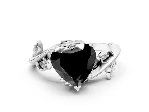 White gold Fancy Black Heart Cut Solitaire Twist Engagement Ring with Leaf Accents and Prong Setting