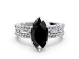 White gold Fancy Black Marquise Cut Diamond Solitaire Ring with Pavé and Channel Set Band