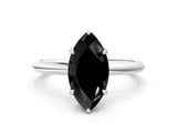 White gold Fancy Black Marquise Cut Diamond Solitaire Ring with Thin Band and Four-Prong Setting