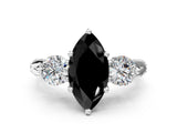White gold Fancy Black Marquise Cut Diamond Three-Stone Ring with Prong Setting and Pavé Band