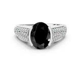 White gold Fancy Black Oval Cut Cut Diamond Channel Set Pave Band with Tension Prong Setting