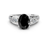 White gold Fancy Black Oval Cut Cut Diamond Engagement Ring with Pavé Band and Four-Prong Setting