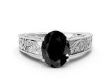 White gold Fancy Black Oval Cut Cut Solitaire Engraved Band with Four-Prong Setting