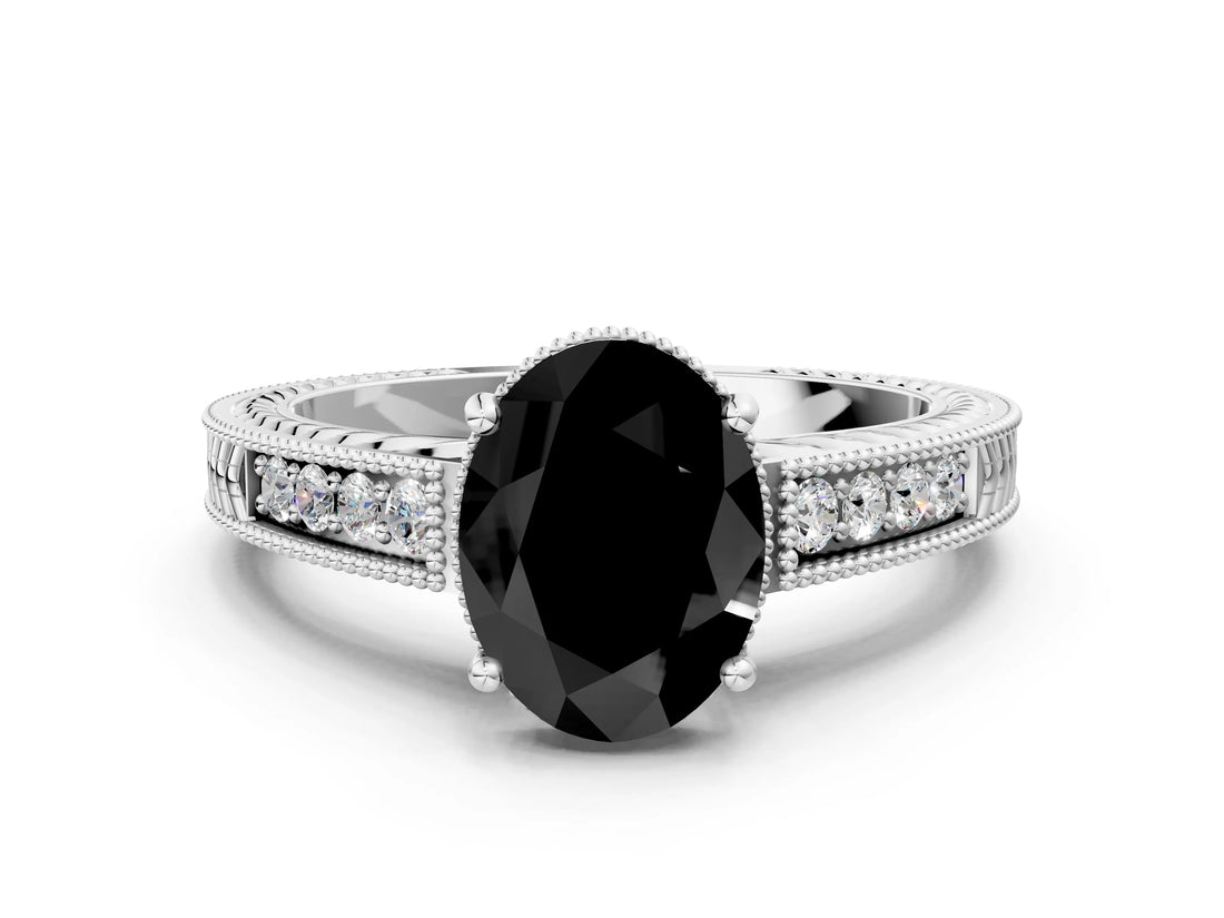 White gold Fancy Black Oval Cut Diamond Engagement Ring with Milgrain Channel Set Band and Prong Setting
