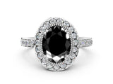 White gold Fancy Black Oval Cut Diamond Halo Ring with Pavé Band and Prong Setting