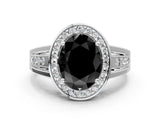 White gold Fancy Black Oval Cut Diamond Halo Ring with Split Shank and Bezel Accents and Prong Setting