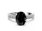 White gold Fancy Black Oval Cut Diamond Milgrain Pavé Engagement Ring with Four-Prong Setting