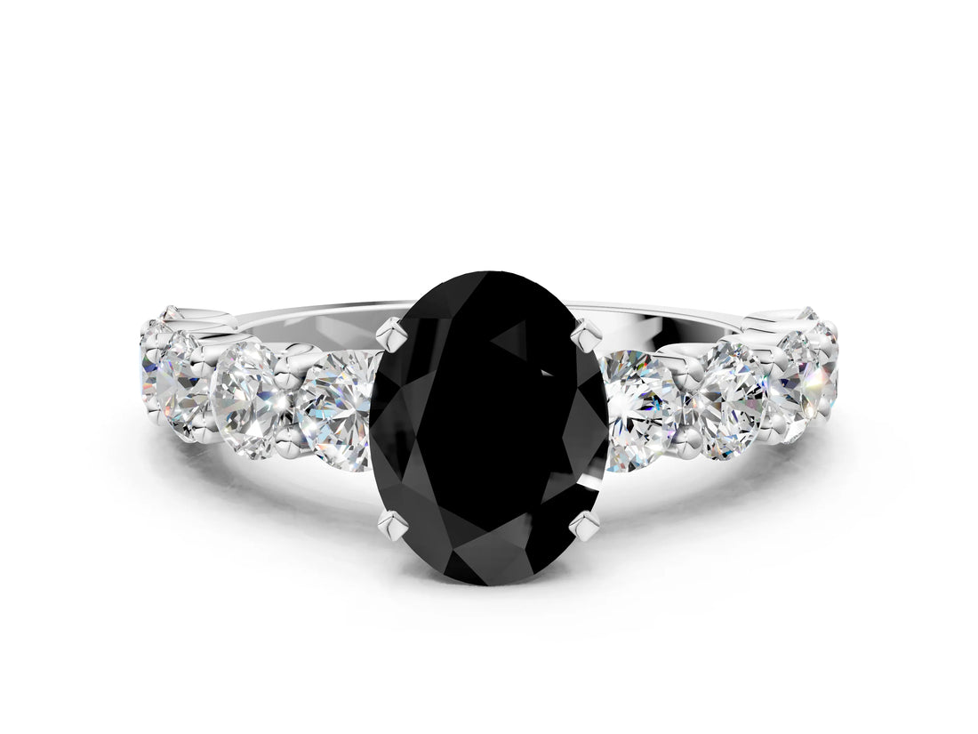 White gold Fancy Black Oval Cut Diamond Prong Setting with Side Stones on a Pave Band