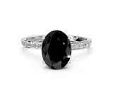 White gold Fancy Black Oval Cut Diamond Solitaire Engagement Ring with Pavé Band and Prong Setting